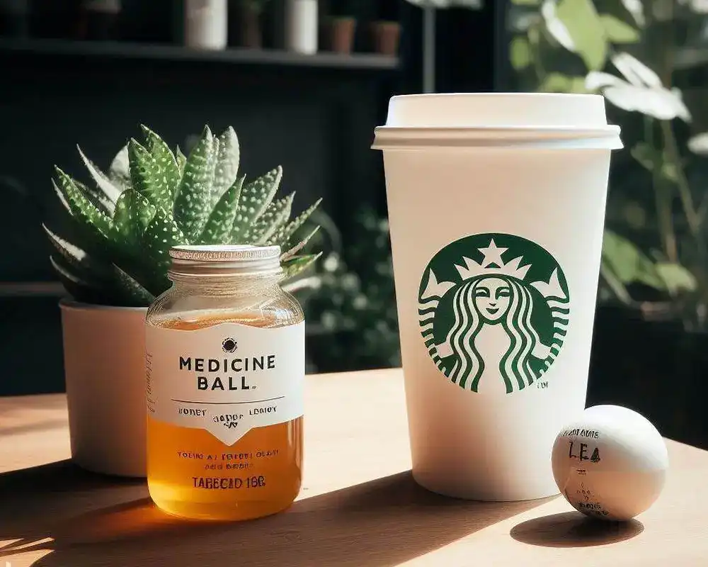 A Steaming Cup Of Medicine Ball Starbucks, A Soothing Blend Of Herbal Tea, Honey, And Citrus, Offering A Delightful Boost To Your Day.